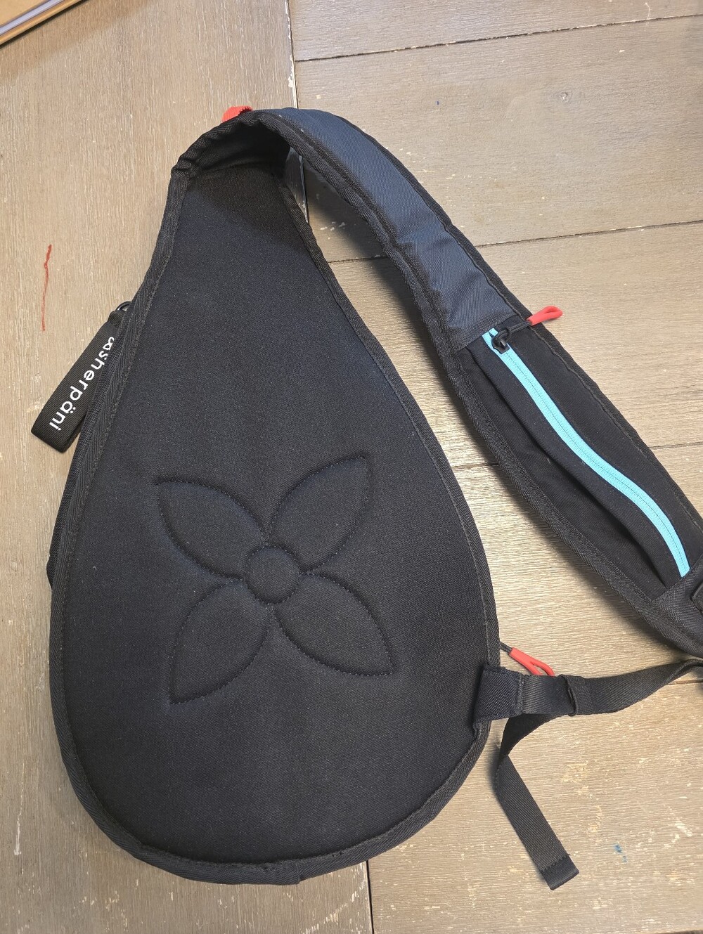 Sherpani black sling bag with blue and orange accents - Picture 5 of 5
